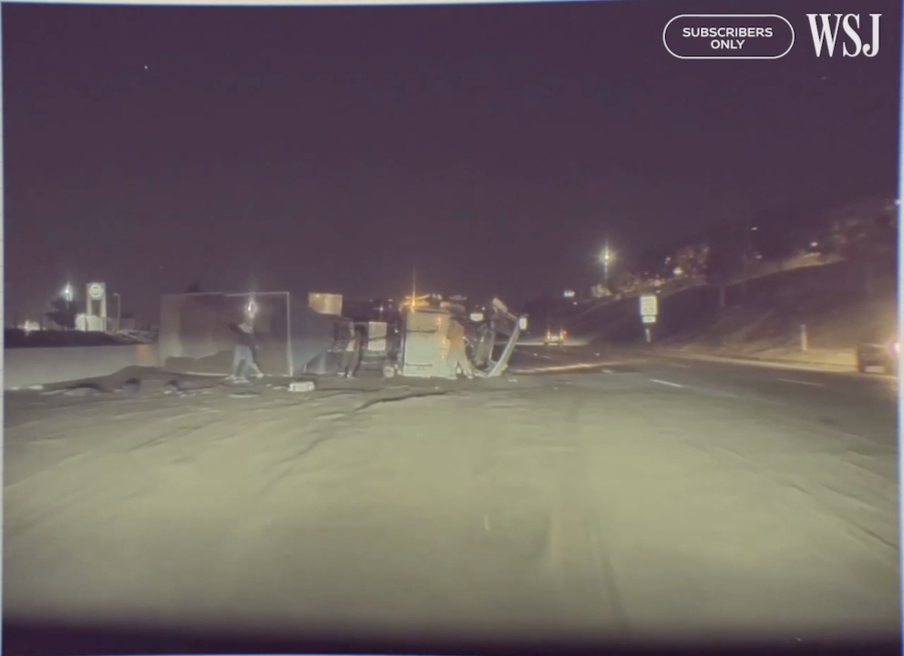 Crash, Tesla collides with flipped truck